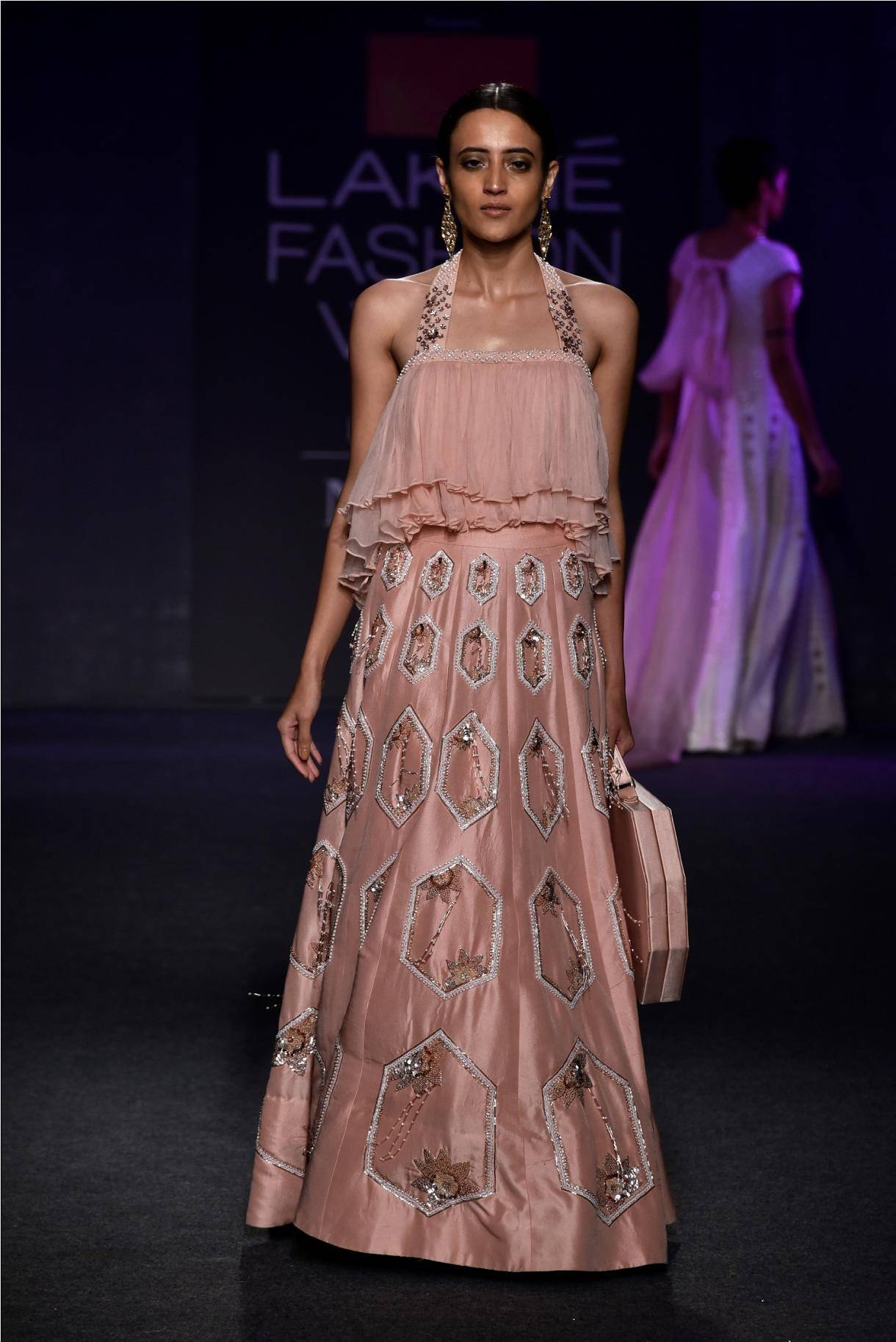 Actress Urvashi Rautela walked for Pink Peacock Couture at LAKME