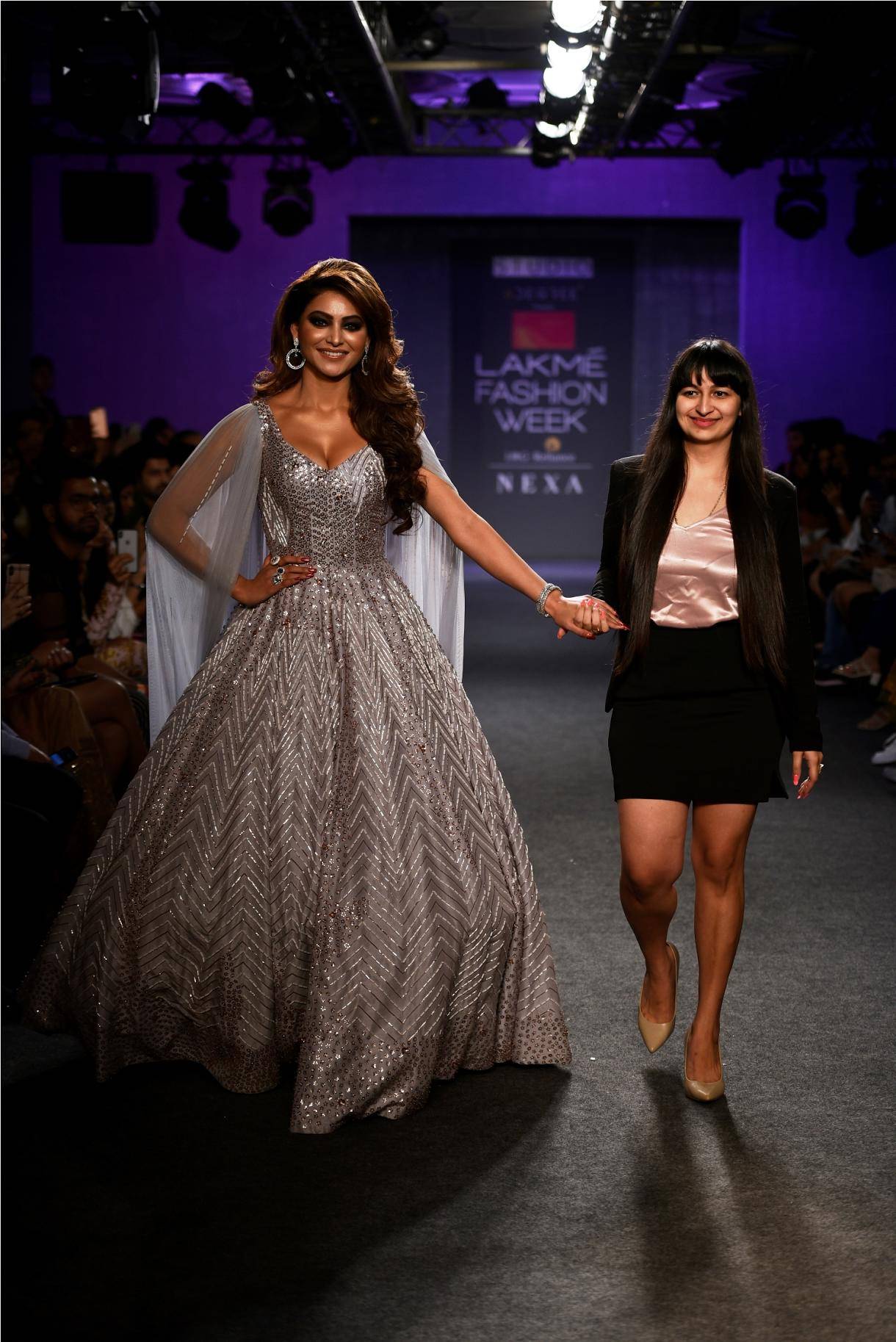 Actress Urvashi Rautela walked for Pink Peacock Couture at LAKME